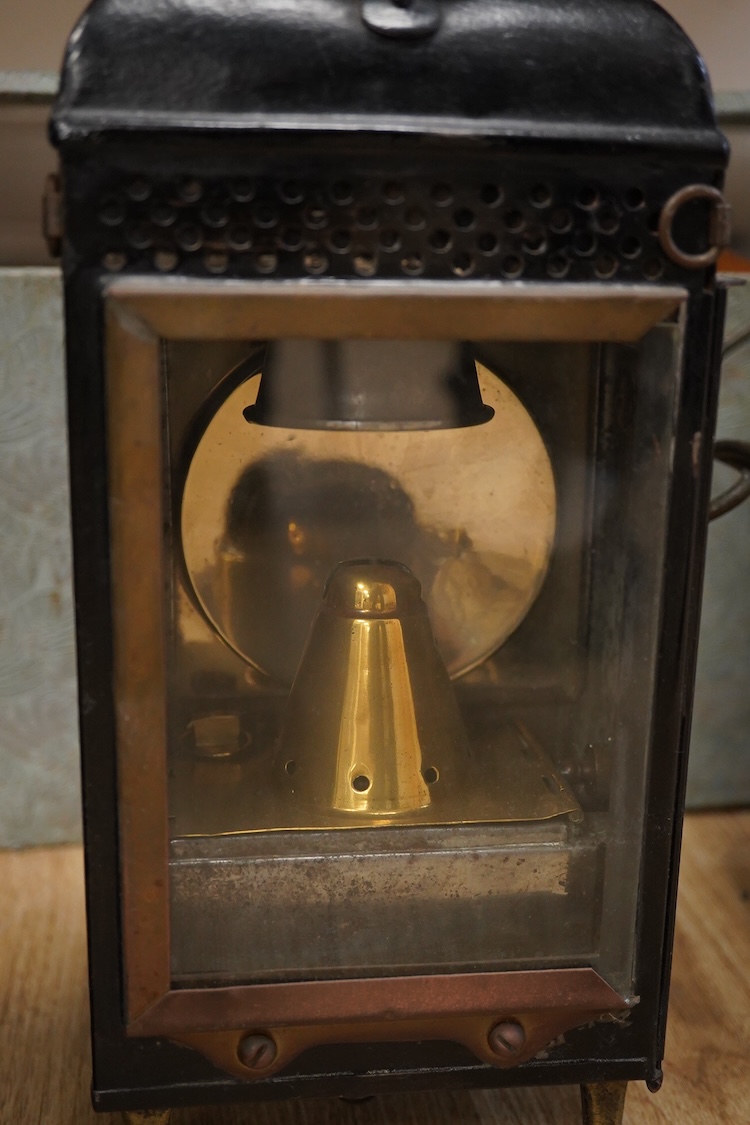 Four various styled lanterns, tallest 42cm high